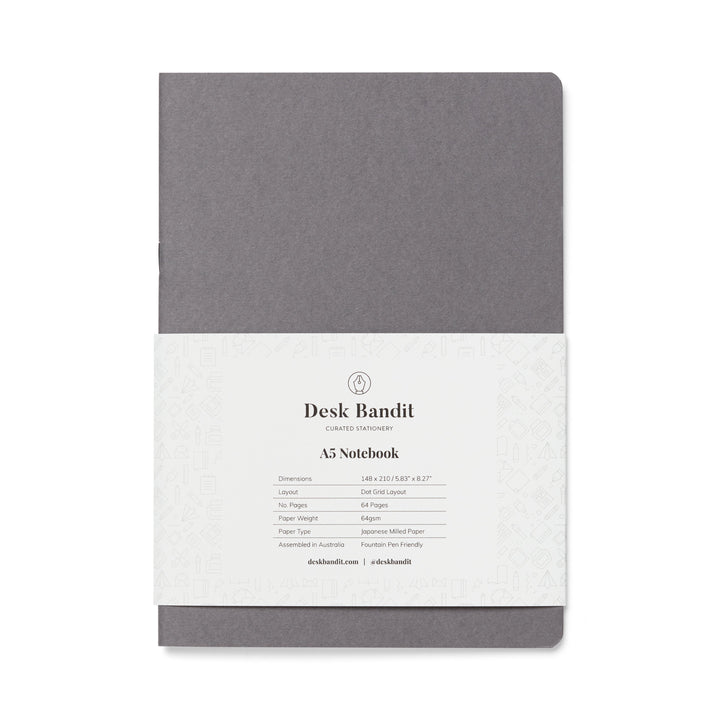Tomoe River Notebook - A5 (Dot Grid) with grey cardstock cover, in paper sleeve, contains 64 pages of fountain-pen-friendly dot-grid paper, ideal for journaling.