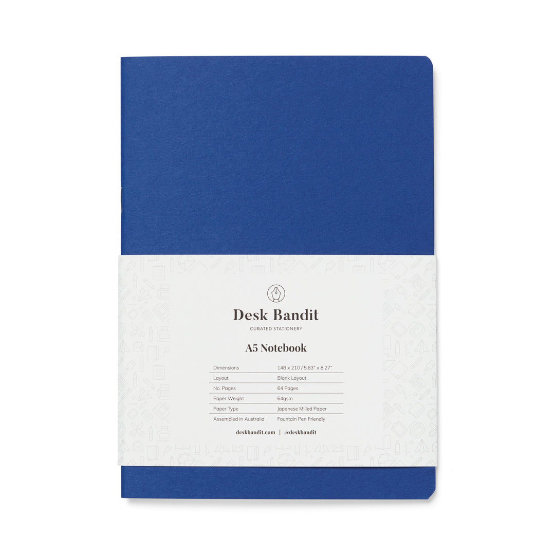 Japanese-Milled Notebook - A5 (Blank) by Desk Bandit, featuring blank 64-page layout on fountain pen friendly paper, wrapped in a detailed white belly band.