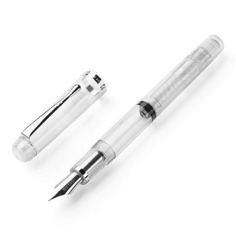 Konrad Acrylic Flex - Clear fountain pen with a transparent barrel and cap, featuring a steel flex nib and twist piston filler, displayed uncapped.