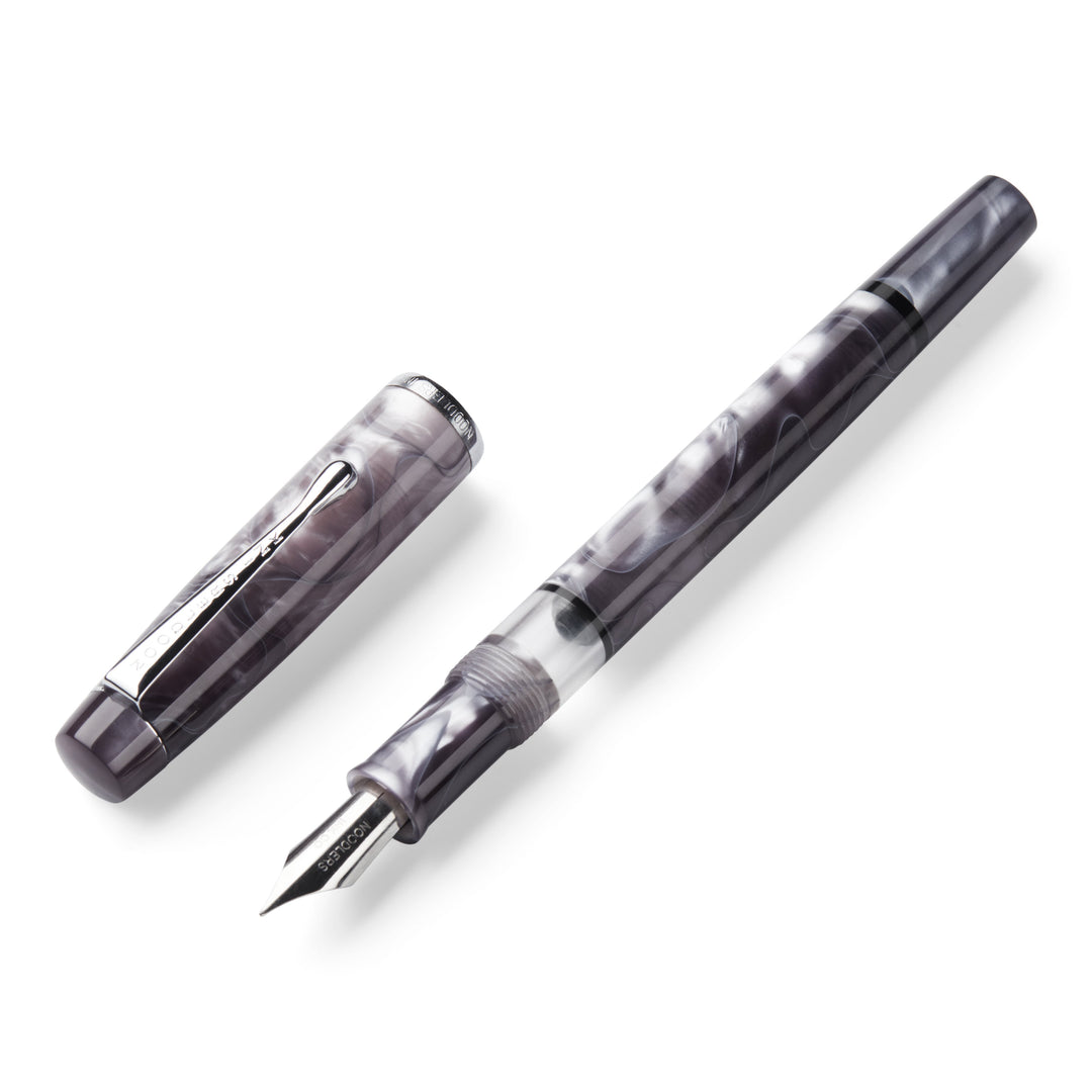 Konrad Acrylic Flex - Appalachian Pearl fountain pen with marbled-gray acrylic body, uncapped to reveal a stainless-steel flex nib and clear ink reservoir on a white background.
