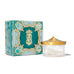 The Carousel Inkwell - Polished Edition features a ribbed glass jar with a gold carousel lid, paired with an ornate teal and gold box.
