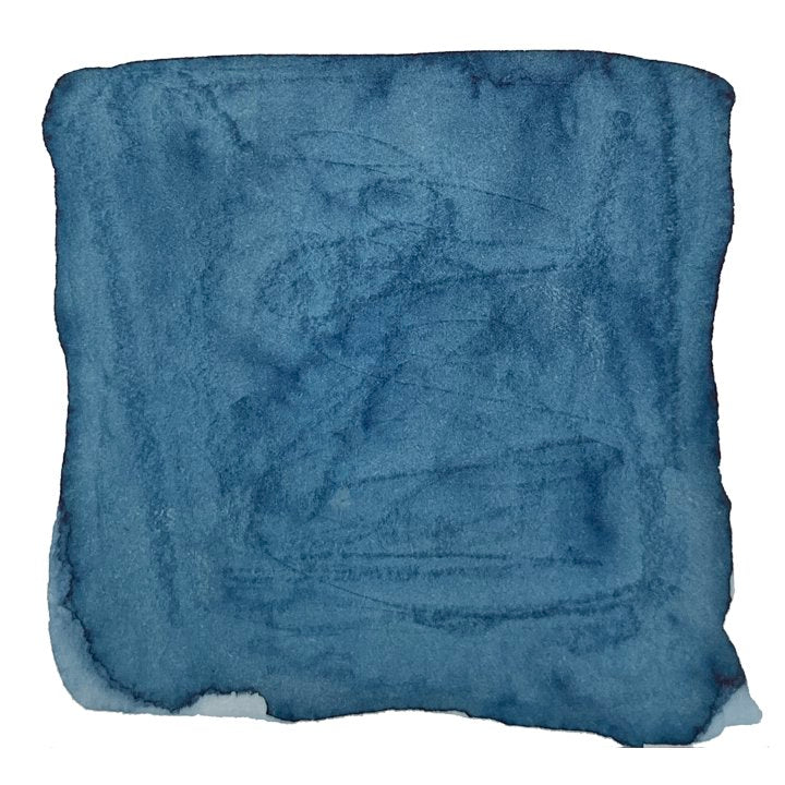 Square swatch of watercolor, illustrating Taccia's Aqua Blue (Jeans) ink, with varied tones and textures, inspired by denim, in a 40ml bottle.