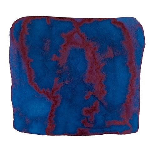 Abstract watercolor pattern in deep cobalt-blue with maroon veins, representing Taccia's Clear Navy (Jeans) ink sample, inspired by denim jeans, 2ml bottle.