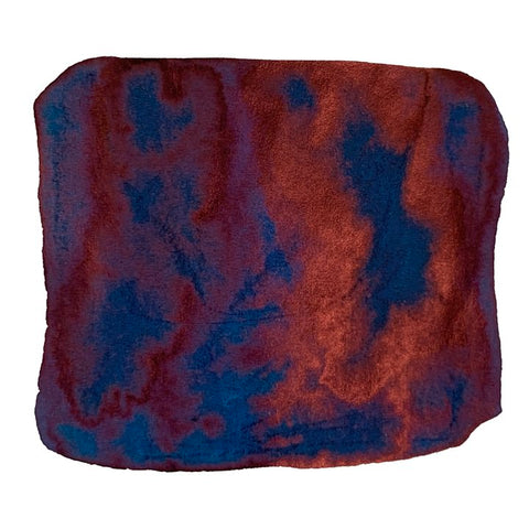 Plush, tufted fabric swatch resembling microfiber in rusty red/orange with deep blue patches, representing Taccia's Navy Blue (Jeans) ink sample, 2ml.