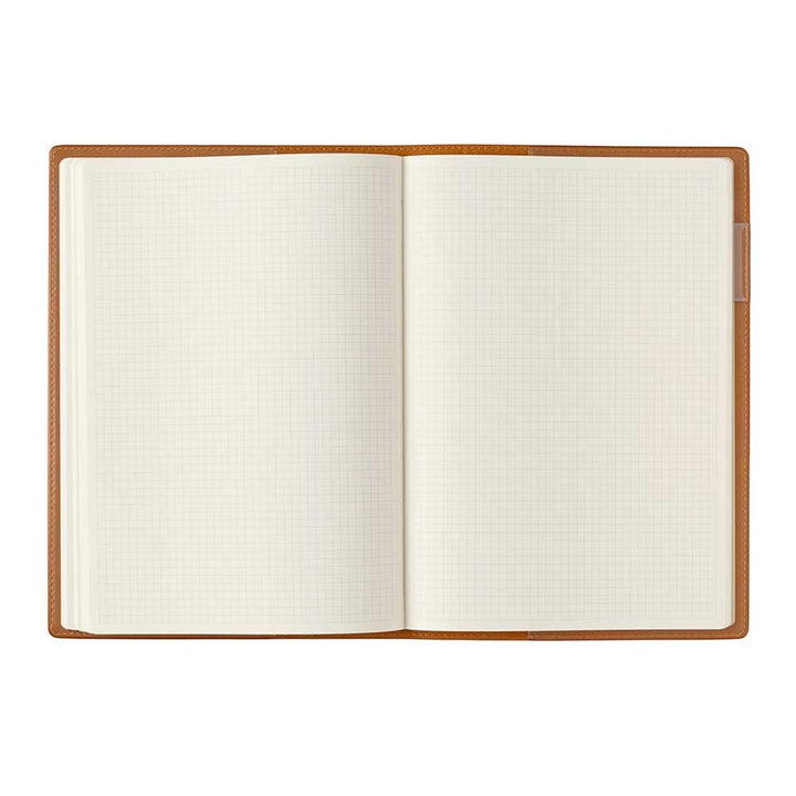 2026 PDCA Planner - A5 (Camel) features a brown leatherette cover and grid pages, ideal for fountain pen users seeking a refined, Japanese-crafted organization tool.