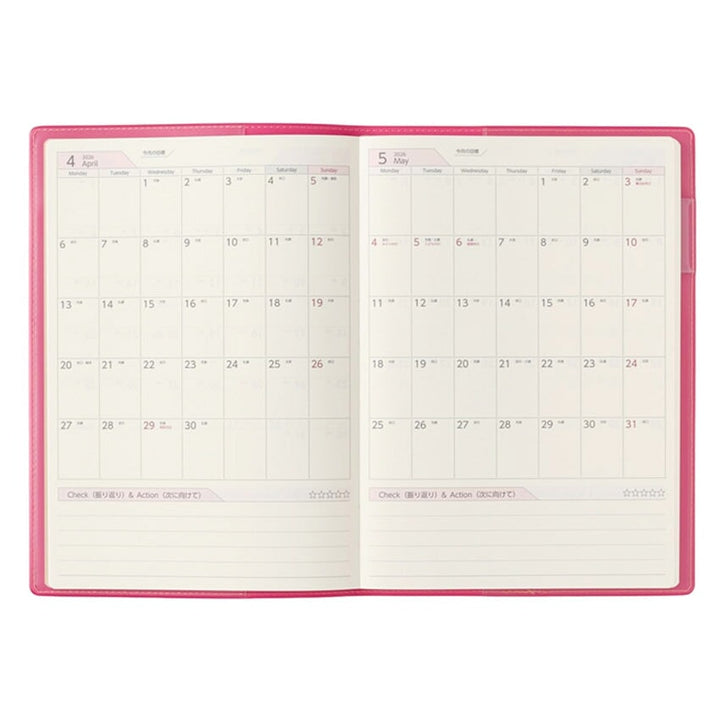 2026 PDCA Planner - A5 (Pink) with April and May calendars open, featuring lined note sections, showcasing Japanese craftsmanship from NOLTY, available at Desk Bandit.