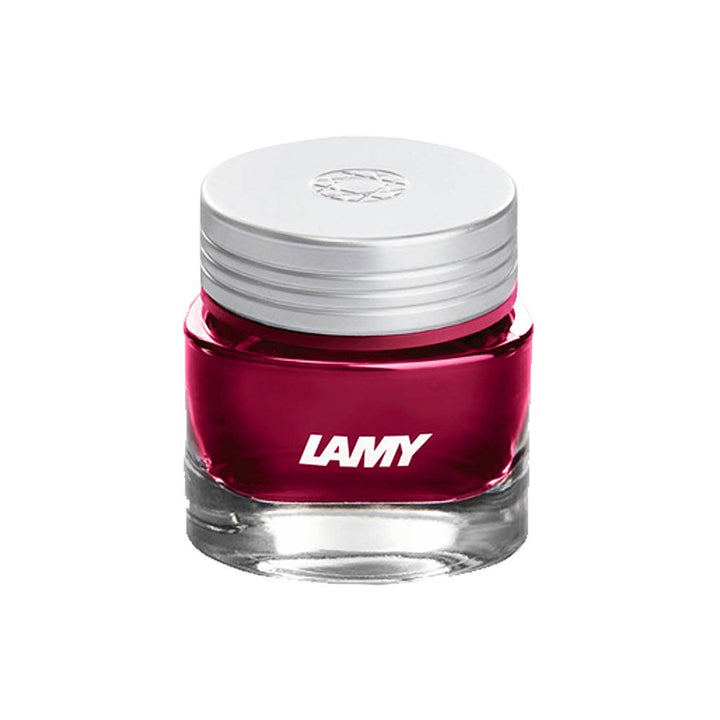 Lamy T53 Crystal Ink - Ruby - 2ml, in a small clear glass bottle with a silver screw-top lid, showcases premium German craftsmanship.