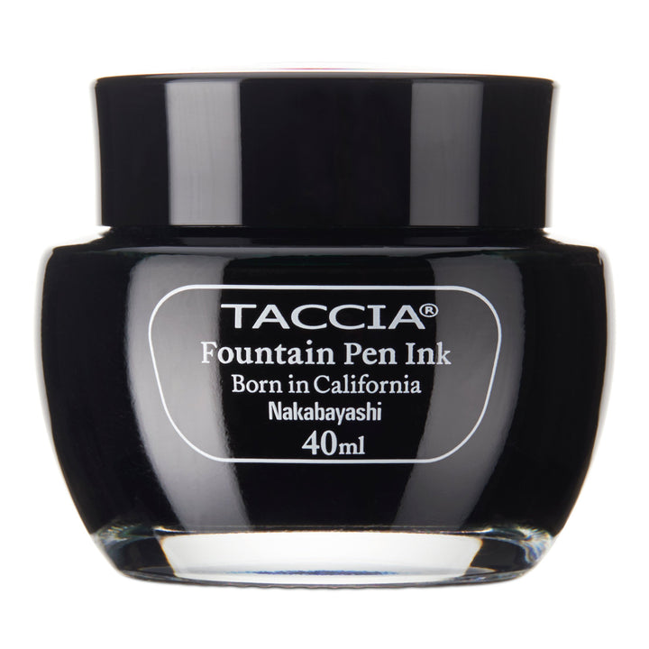 Taccia Uguisu - 40ml glass bottle of fountain pen ink, labeled “Born in California,” featuring a standard black ink by Nakabayashi, inspired by Japanese color perception.