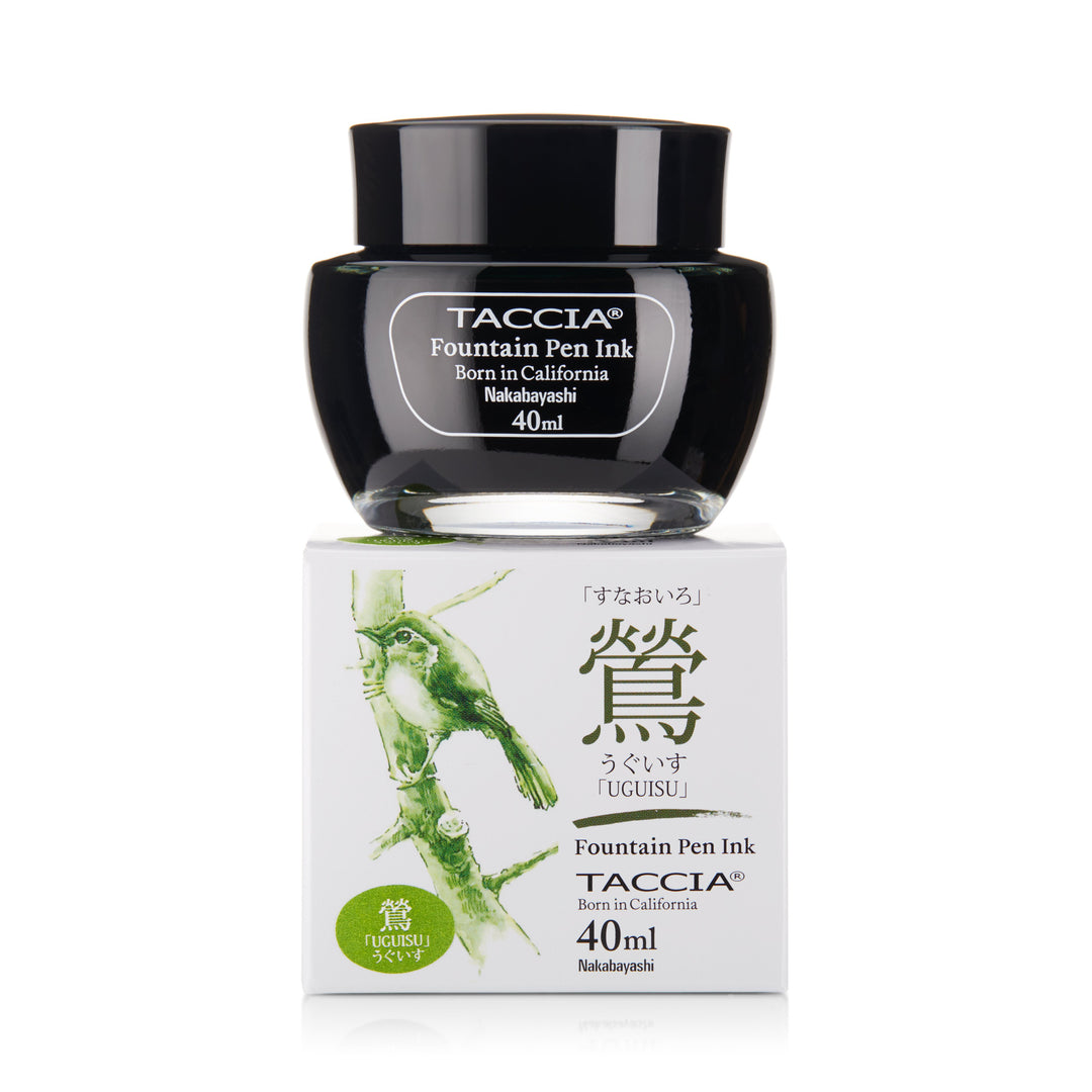 Taccia Uguisu 40ml fountain pen ink bottle with black cap on a box featuring a green bird illustration and Japanese characters.