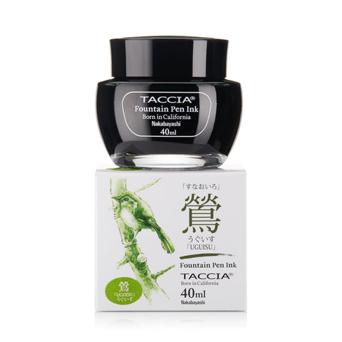 Taccia Uguisu 40ml fountain pen ink bottle with black cap on a box featuring a green bird illustration and Japanese characters.