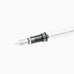 VAC 700R (Clear) - Stub 1.1 features a visible metal nib and transparent barrel, showcasing its vacuum filling system against a white background.