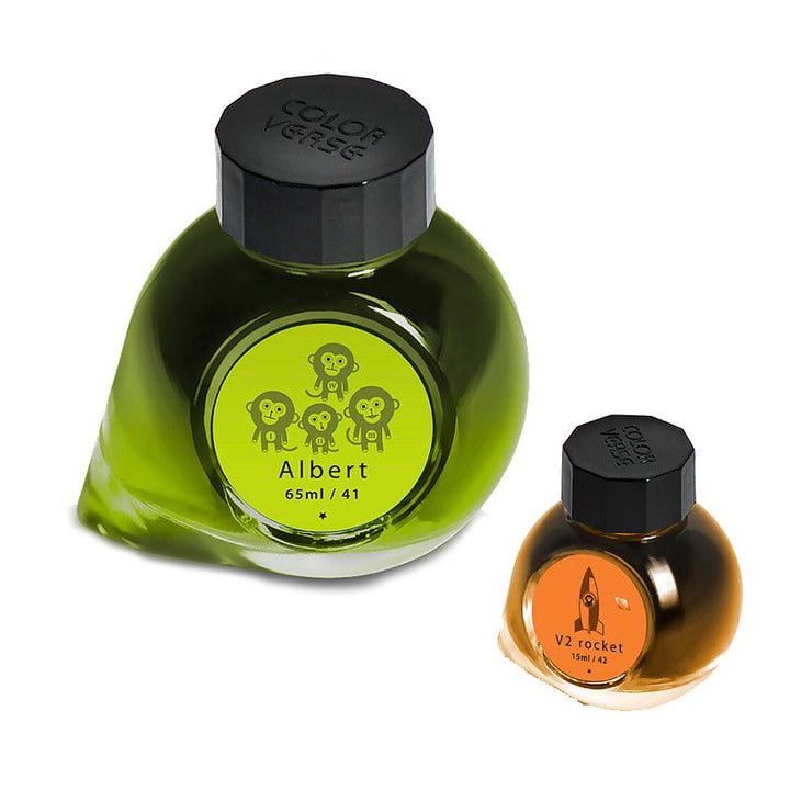 Two Colorverse ink bottles: a large green Albert 65 ml with monkey motif, and a small amber V2 rocket 15 ml with rocket icon.