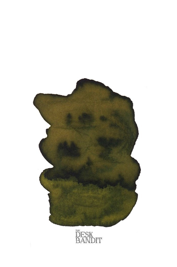 Alt-Goldgrun (2ml) ink swatch showing green-olive tones with darker shading, featuring THE DESK BANDIT logo, demonstrating Rohrer & Klingner's quality dye-based fountain-pen ink.