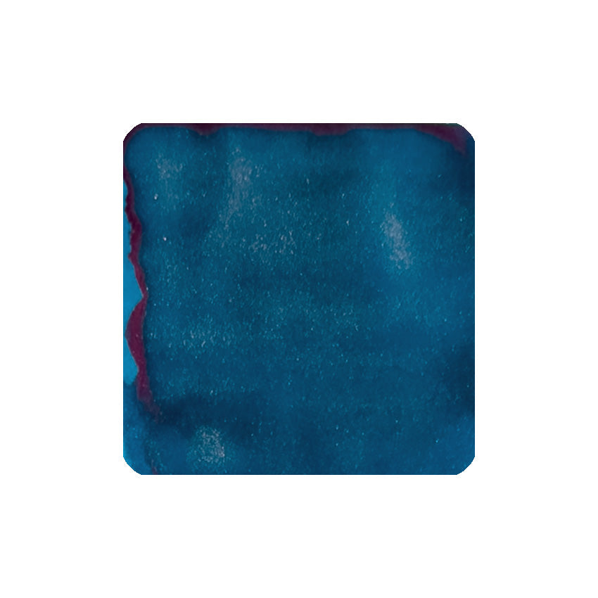 Diamine Arctic Blue (Shimmer) fountain pen ink with deep teal-blue hue, silvery shimmer, and magenta sheen, 50ml bottle, showcasing vibrant and pearly effects.