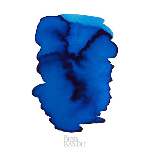 Australian Sky Blue - 2ml ink sample, showcasing an abstract deep blue wash on white background, illustrating fountain pen ink's rich gradients and organic flow.