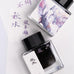 Fanyantan Autumn Waters - 2ml fountain pen ink sample, featuring two square glass bottles with a white-labeled 秋水 bottle, displayed on a calligraphy sheet with purple ink characters.
