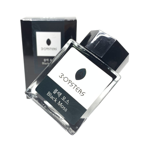 3Oysters Black Moss - 38ml fountain-pen ink in a square glass bottle, with a box behind, designed for easy tilt to access every drop.