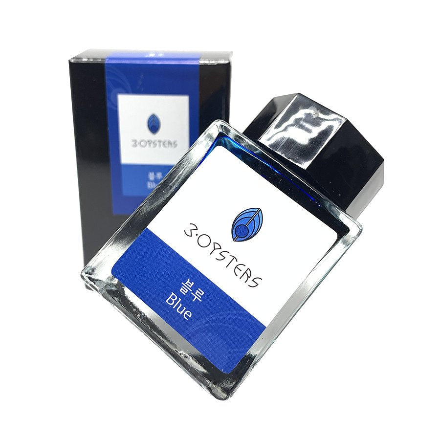 Square glass bottle of 3Oysters Blue - 2ml fountain-pen ink, with black cap, displayed with matching cardboard box, part of the Delicious Series from Korea.