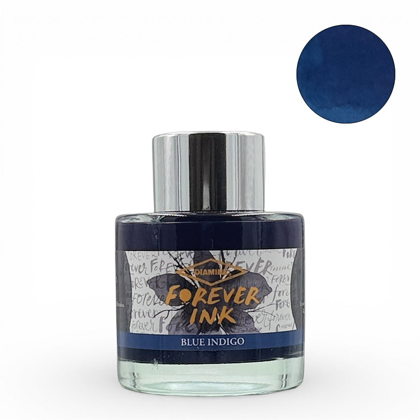 Diamine Blue Indigo Forever Ink, 50ml glass bottle with silver cap, shown with deep blue swatch. Waterproof, lightfast fountain pen ink for lasting writing and artwork.