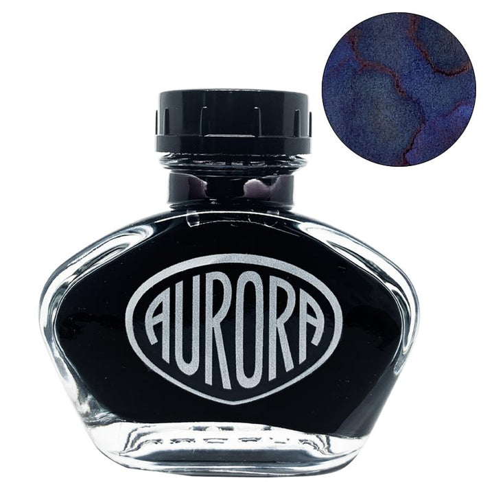 Aurora 100th Anniversary - Blue Black (55ml) fountain-pen ink in a glass bottle, features deep blue ink with a red sheen in a round swatch inset.