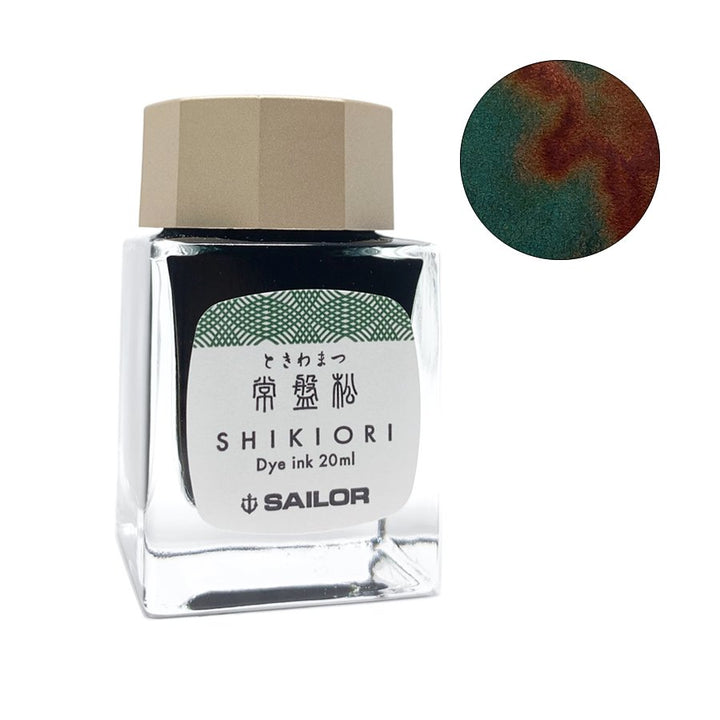 Shikiori Tokiwa-Matsu - 20ml glass bottle of deep green fountain-pen dye ink, includes a swatch displaying its red-bronze sheen on paper.