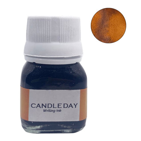 Candle Day - 20ml glass bottle of Krishna Inks. Features a label and showcases its coppery, warm ink, crafted in Kerala by Dr. Sreekumar.