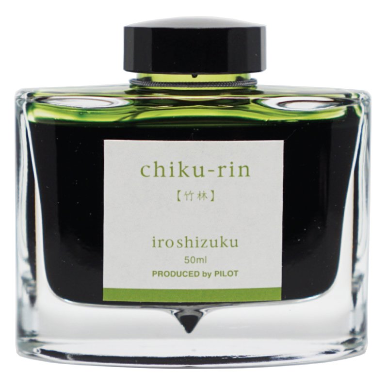 Iroshizuku Ink - Chiku Rin (50ml) in a clear glass bottle, showcasing its bamboo forest inspiration, highlighting Pilot's craftsmanship in fountain-pen inks.