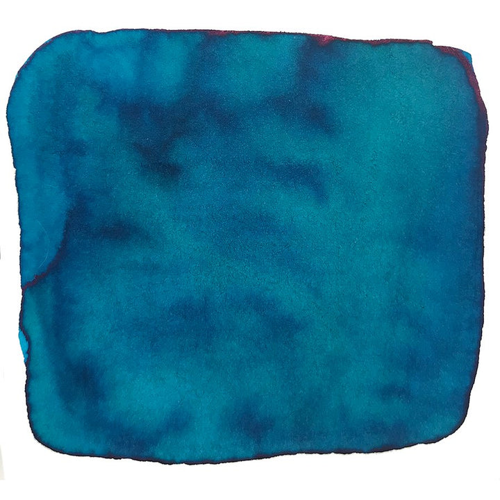 Clearwater Rain - 50ml: Abstract swatch of blue-green watercolor with a mottled texture, reflecting Robert Oster's unique Australian-inspired ink collection.