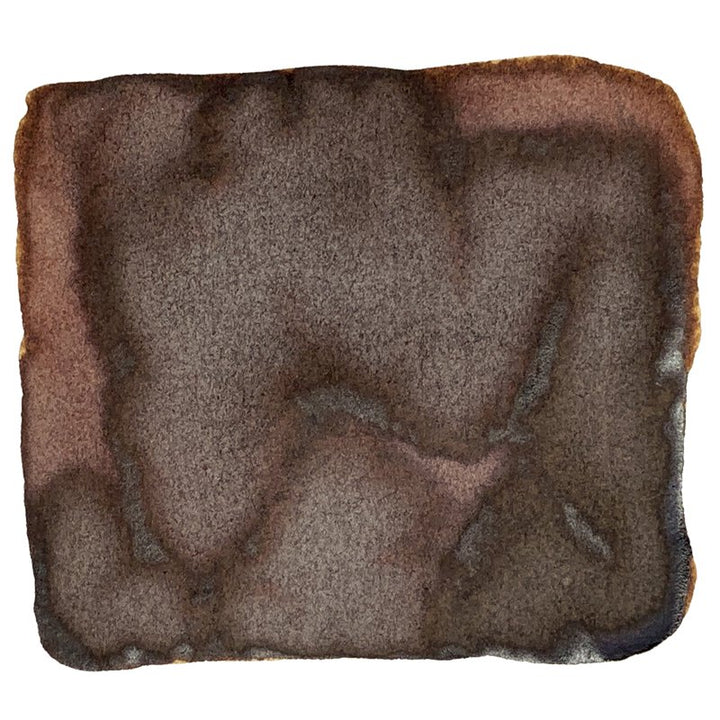 Abstract brown blotch resembling a watercolor stain, representing Colorverse's Coffee Break ink from Season 6, inspired by finding joy in the everyday.