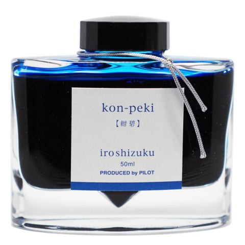 Iroshizuku Ink - Kon Peki (50ml) in a clear glass bottle, showcasing its elegant design and Pilot branding.