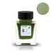 Contact Super Kawanishi (Shimmer) - 2ml: Square glass bottle of mossy-green, glittering ink with a black cap, featuring a cartoon bear and UFO on the label.