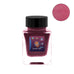 Contact Super Tono (Shimmer) - 2ml ink sample in a glass jar with a space-themed label, showcasing a metallic sparkle when applied on paper.