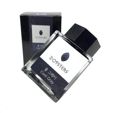 3Oysters Cool Gray fountain-pen ink, 38ml, in a square glass bottle with a faceted black cap, alongside its matching box.