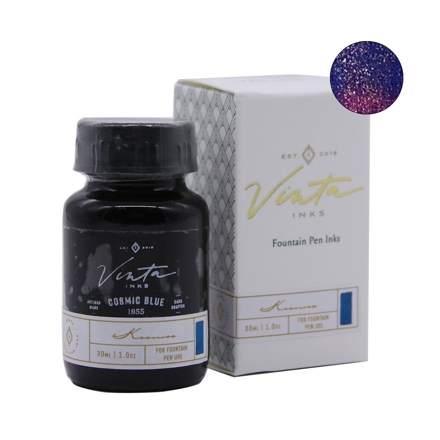 30 ml bottle of Cosmic Blue (Kosmos 1955) ink with box; showcases dark blue-purple hue with red/pink shimmer, inspired by the Philippine sky.