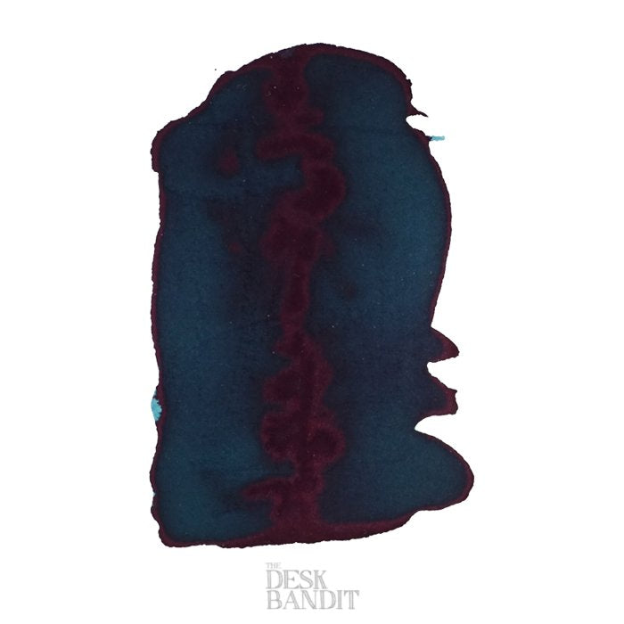 Deep Sea - 2ml ink sample by Robert Oster, featuring a teal-blue swatch with a burgundy sheen, showcasing its vibrant dye-based color.