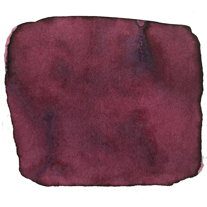 Dusky Pink - 2ml ink sample, showcasing a deep burgundy/maroon watercolor wash with feathered edges and tonal variations, representing Robert Oster's dye-based ink.