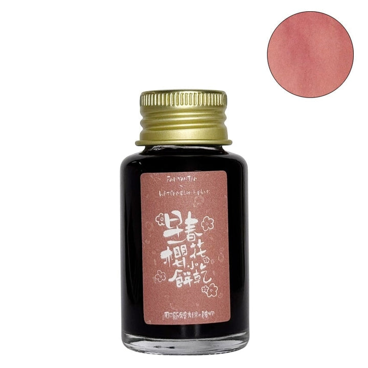 Fanyantan Early Spring Cherry Blossom Cookies fountain pen ink, 30ml glass bottle with a coral-pink hue, adorned with cherry-blossom themed label featuring stylized Chinese characters.