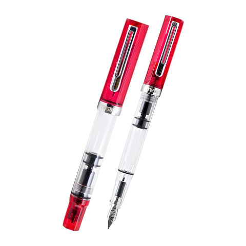 ECO (Transparent Blossom) - Medium fountain pens with clear barrels displaying piston mechanism, topped with translucent red caps, resembling TWSBI's demonstrator models.