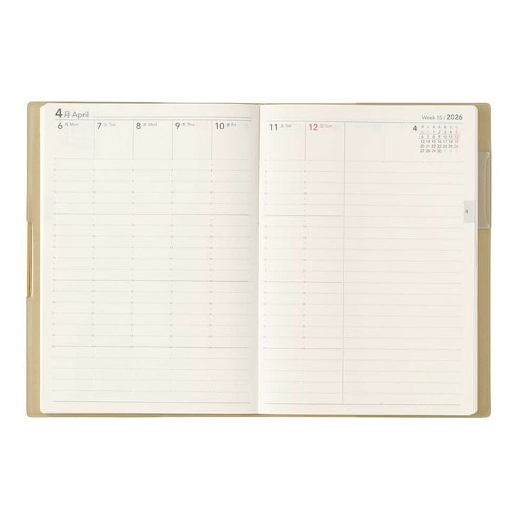 2026 Ecri Plus 7 Weekly Planner - B6, open to April 6–12, 2026, showing vertical columns for time-blocking and a month-at-a-glance April calendar.