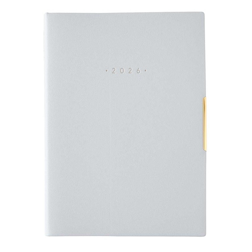 NOLTY 2026 Ecri Plus 8 Weekly Planner - B6, features metallic 2026 on textured cover with gold-tone clasp, ideal for organizing with detailed layouts and Japanese quality craftsmanship.