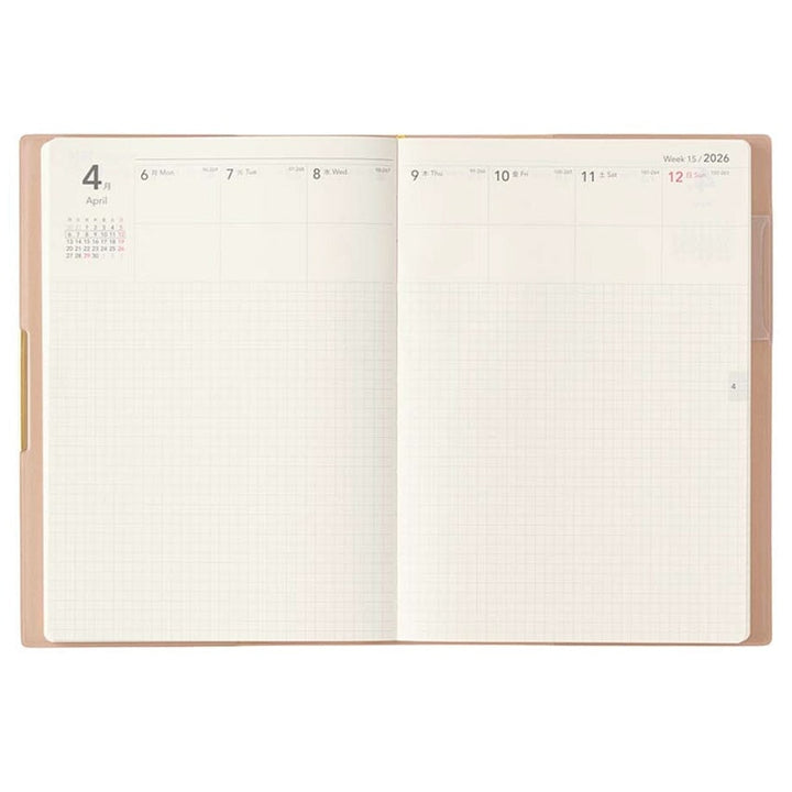 2026 Ecri Plus Memo Planner B6, open view of weekly layout with grid notes, showcasing Japanese craftsmanship in fountain pen friendly design.