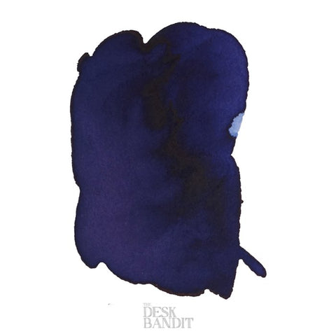 Evening Sapphire - 2ml ink sample, dark blue swab on white background, watermarked The Desk Bandit, showcasing Robert Oster's dye-based ink.