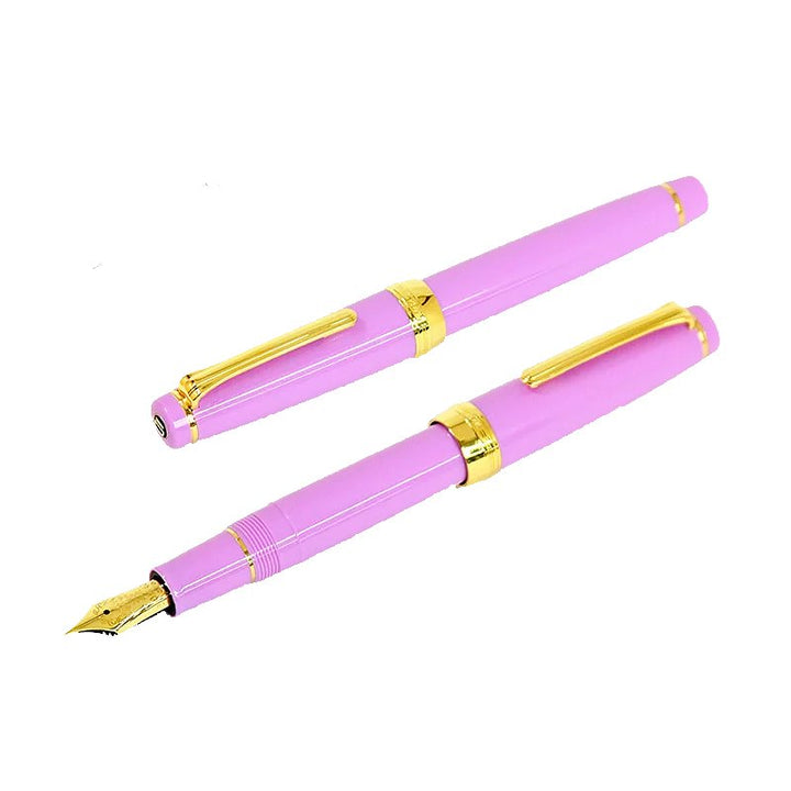 Nagasawa Original Professional Gear - Kobe Hydrangea - Medium-Fine pens in lavender-pink with gold trim, one capped, one uncapped showing the 21K gold nib.
