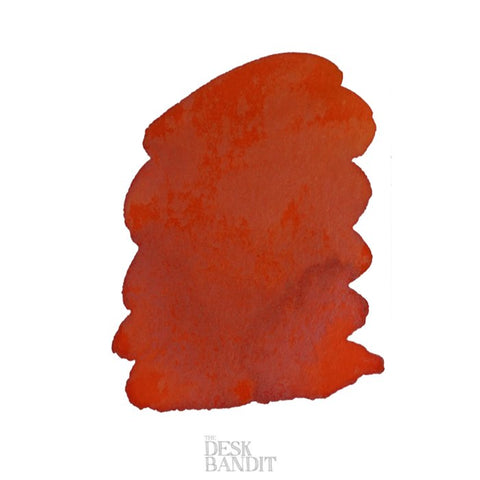 Iroshizuku Ink - Fuyu Gaki (2ml) sample; features a swatch of burnt-orange ink, showcasing an organic texture. Includes THE DESK BANDIT logo below.