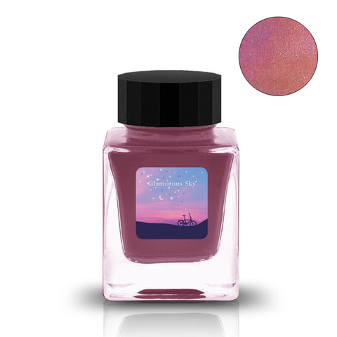 Glamorous Sky - 30ml: Square glass bottle of shimmery pink-mauve nail polish with black cap, featuring a twilight-themed label and close-up shimmer detail.
