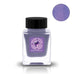 HakomoQuartz (Shimmer) fountain pen ink by Tono & Lims in a 30ml glass bottle, featuring a quartz-crystal emblem and filled with shimmery pastel-purple liquid.