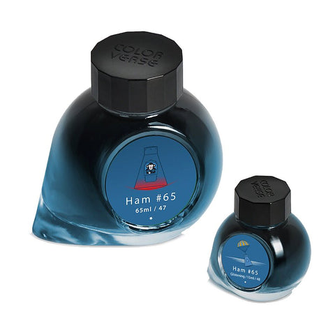 Two glass bottles of Colorverse Ham #65 - 65ml standard and 15ml glistening ink, with faceted black caps and blue labels, showcasing the ink set.