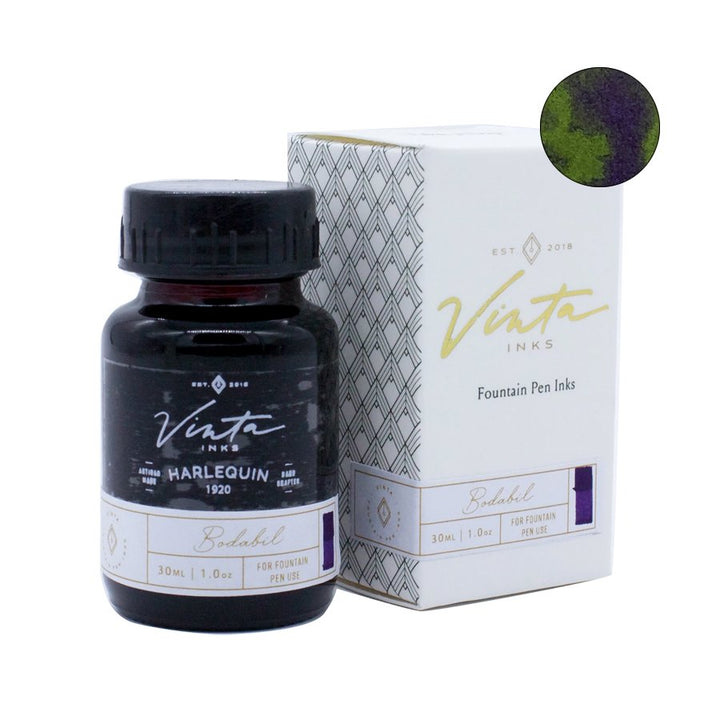 Vinta Inks “Harlequin 1920” Bodabil, 30 mL bottle, displayed with its box and a greenish-yellow ink swatch with purple sheen accents.