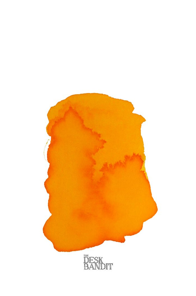 Helianthus (2ml) ink sample by Rohrer & Klingner, featuring a bright-orange watercolor wash with THE DESK BANDIT text, highlighting its vibrant dye-based quality.