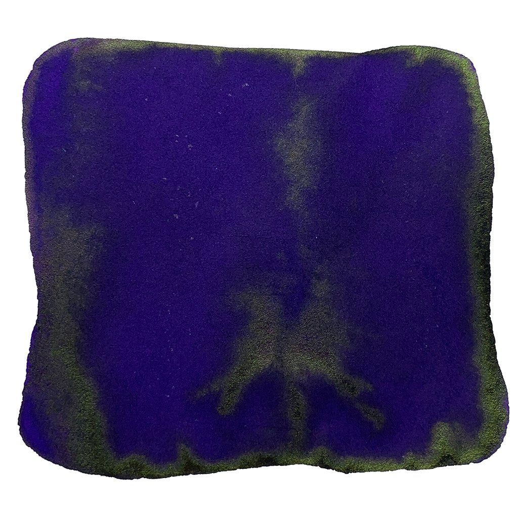 Close-up of Bungubox Imperial Purple ink swatch, showing deep blue-purple color with a greenish metallic sheen where the pigment has settled.